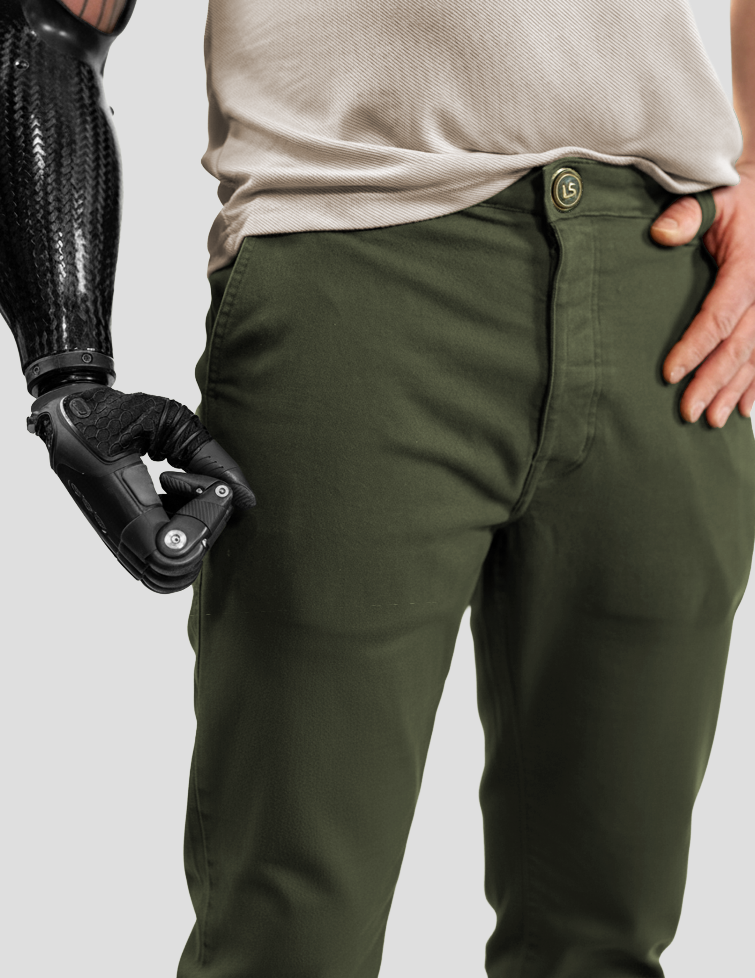 Man wearing All That Chino style pants with a neutral background